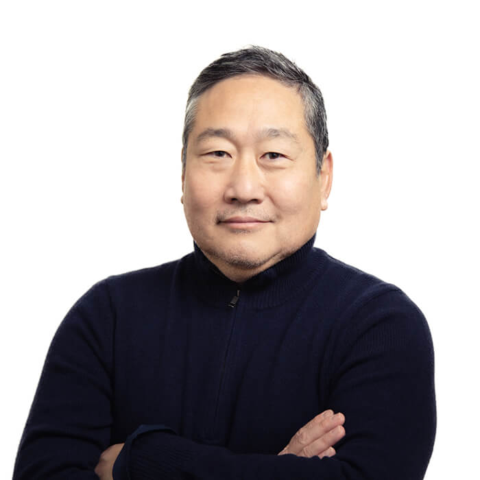 Asian male wearing a black sweater