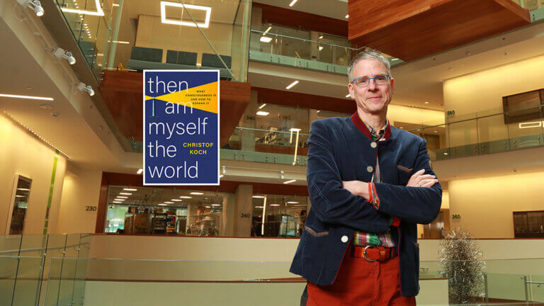Christof Koch standing next to new book cover