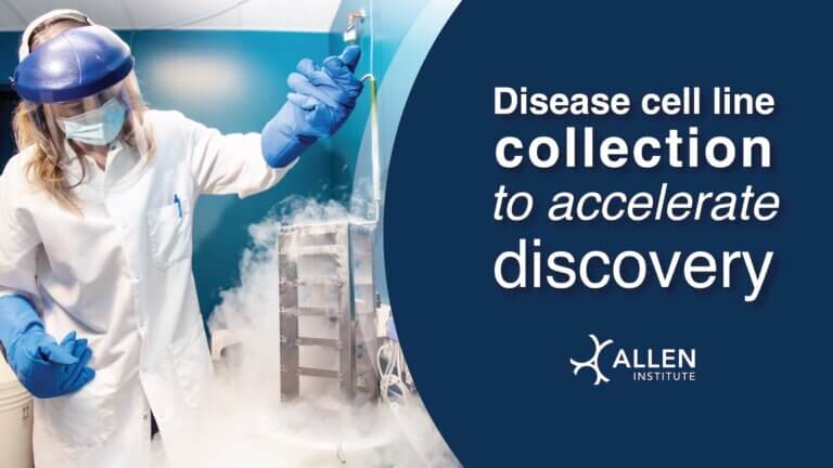 Scientist with protective gear holding frozen cell lines