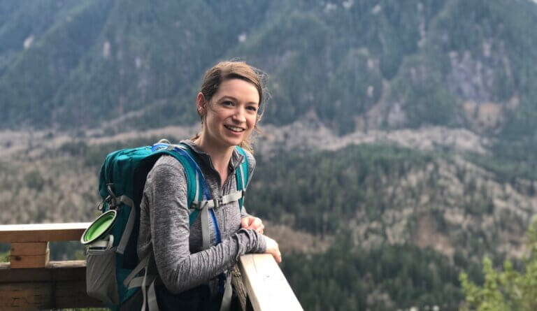 Mallory Rath, a long covid patient, posing during a hike.