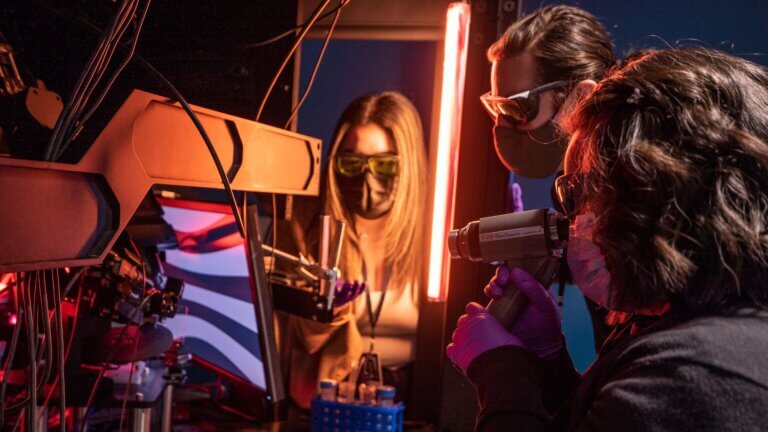 Scientists work with neuropixels probes in the lab at the Allen Institute