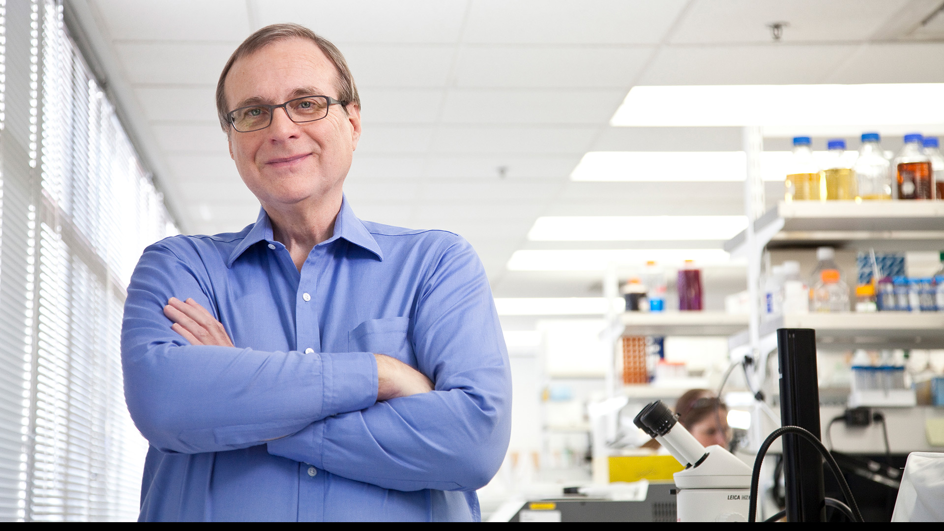 Portrait of Allen Institute founder Paul G. Allen in a research lab.