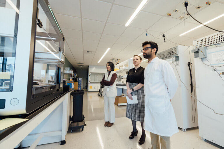 Scientists standing in a laboratory